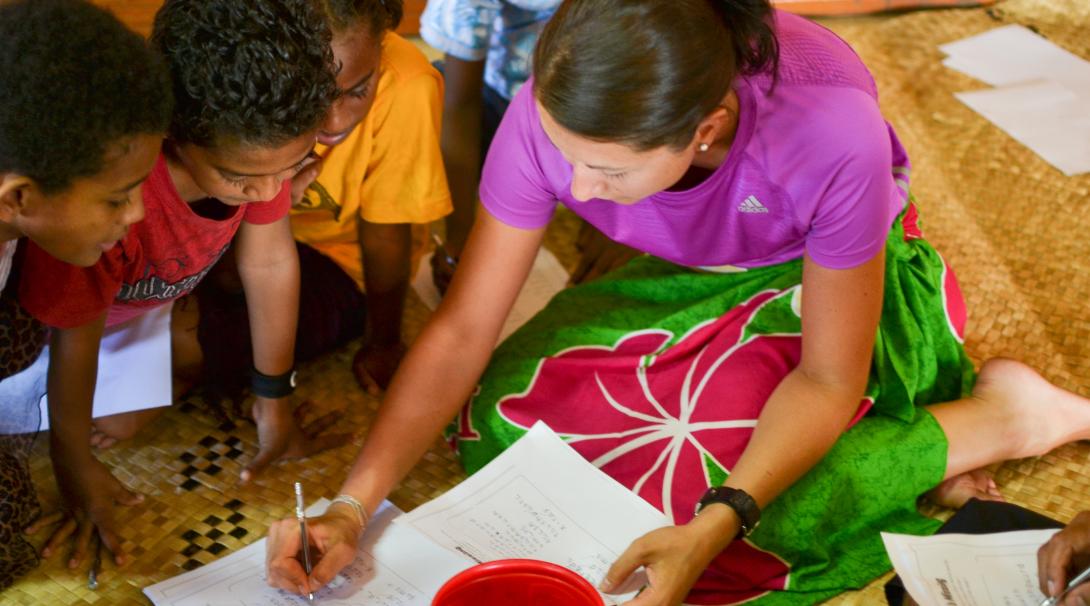 Community and childcare volunteer working with children in Fiji